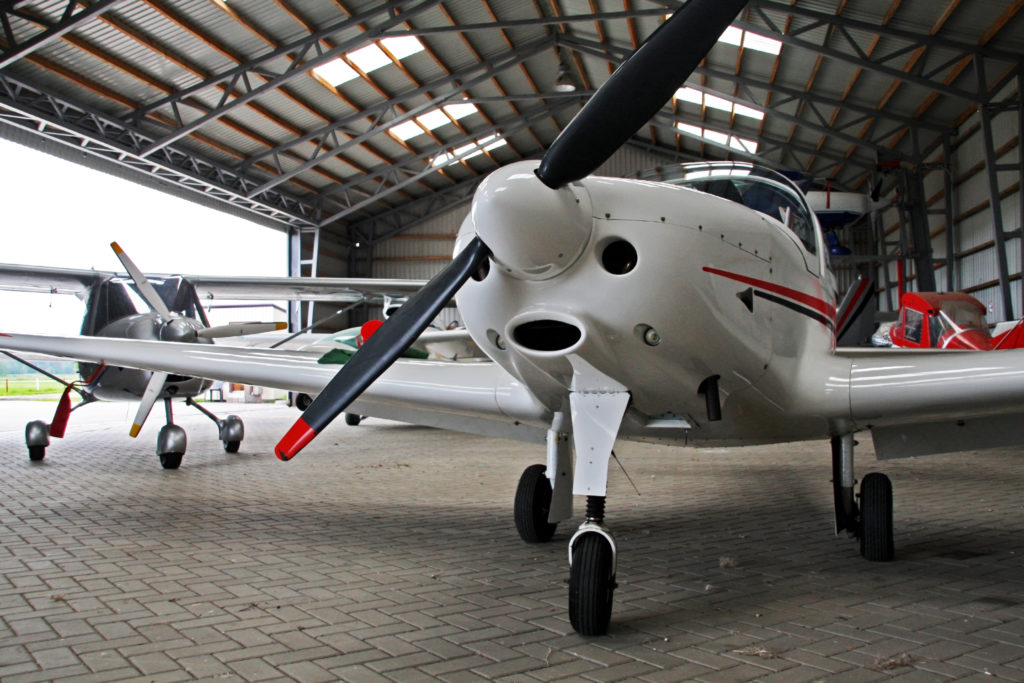 small airplanes in hangar