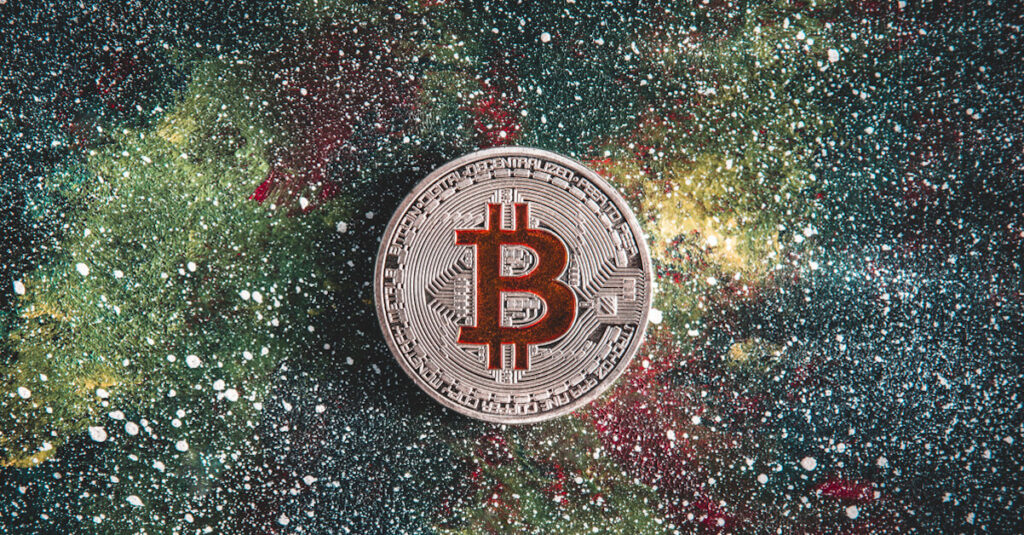 bitcoin above galaxy of stars