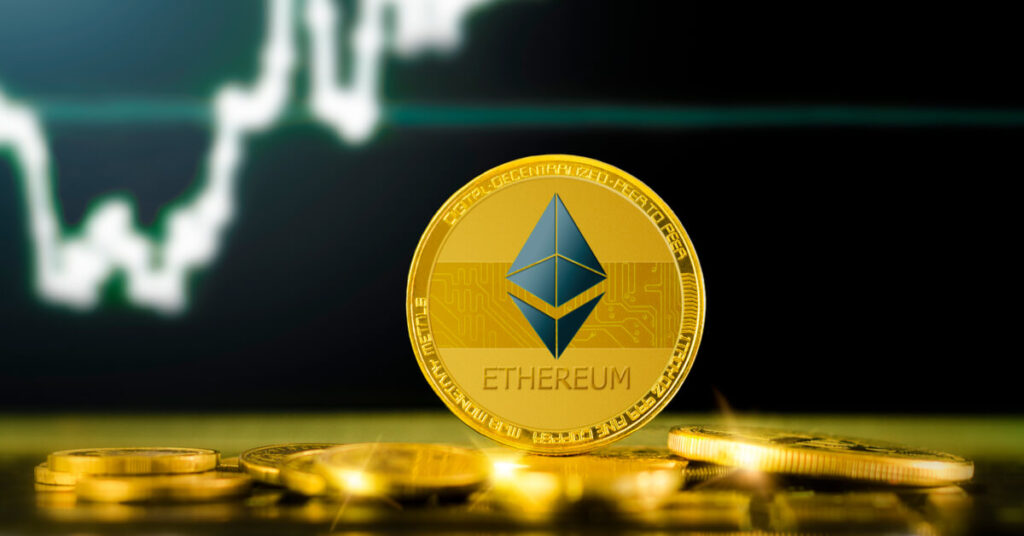 Ethereum gold coin  at the foreground of a chart