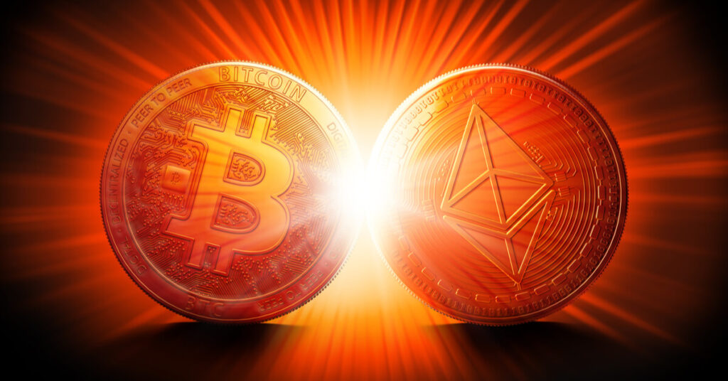 Red Bitcoin and Ethereum coins next to each other