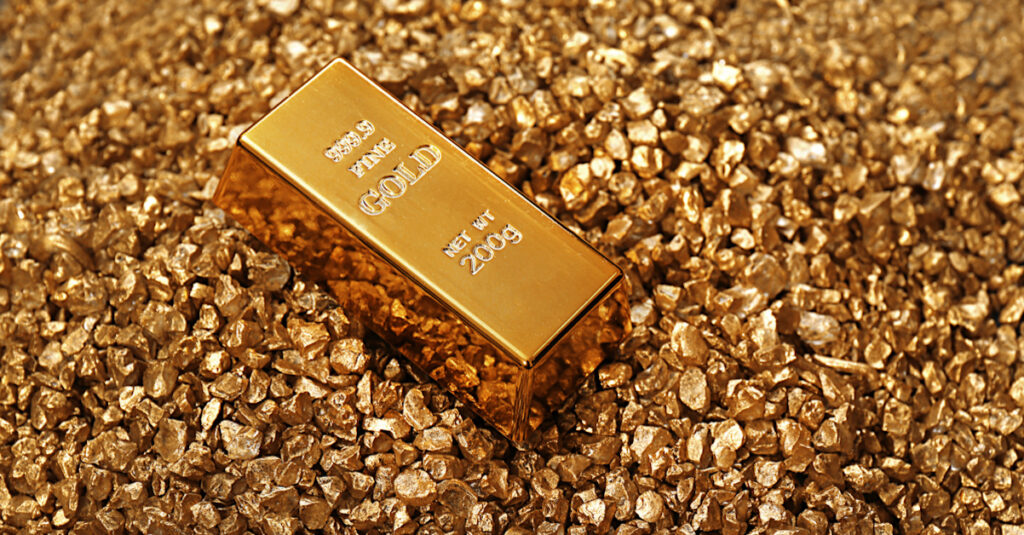Gold bar on top of ground gold