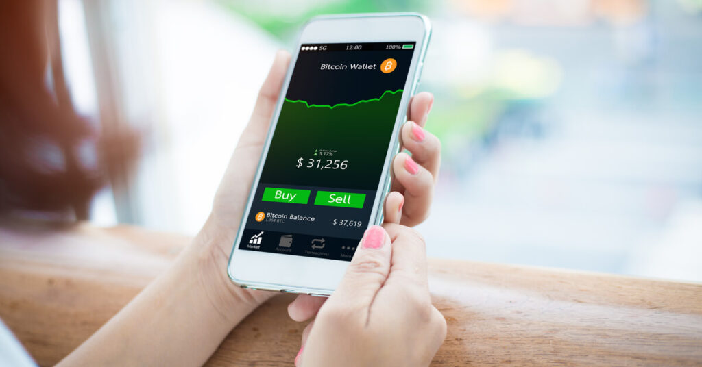 Phone showing dashboard to buy and sell Bitcoin