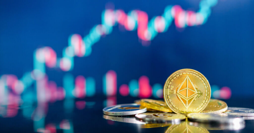Ethereum coin in front of price chart