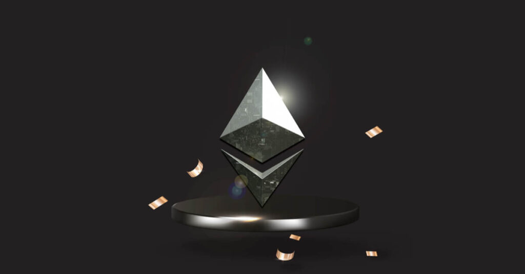 Silver Ethereum logo hovering over a silver disk with a black background behind