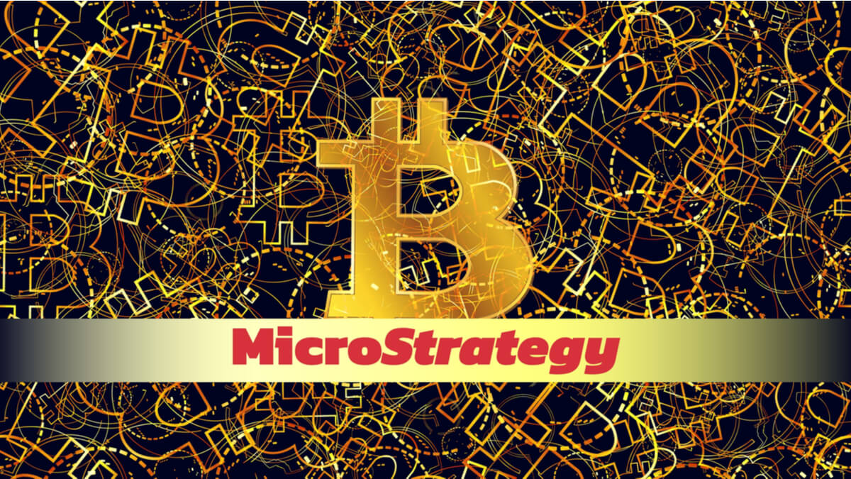 Golden Bitcoin on a black background with MicroStrategy logo highlighted underneath.