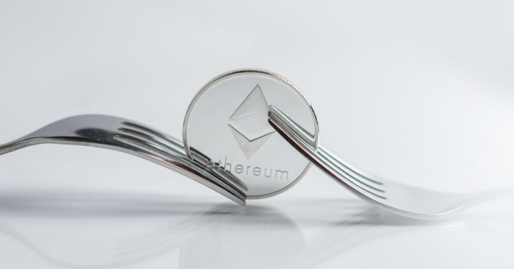 Ethereum Cryptocurreny Coin Placed between Forks