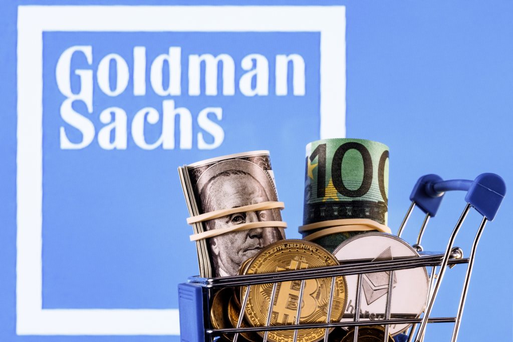 Fiat and Cryptocurrencies at the foreground of Goldman Sachs logo