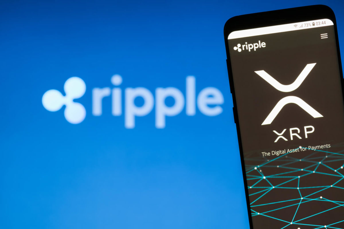 ripple logo with a smart phone and XRP logo on its screen