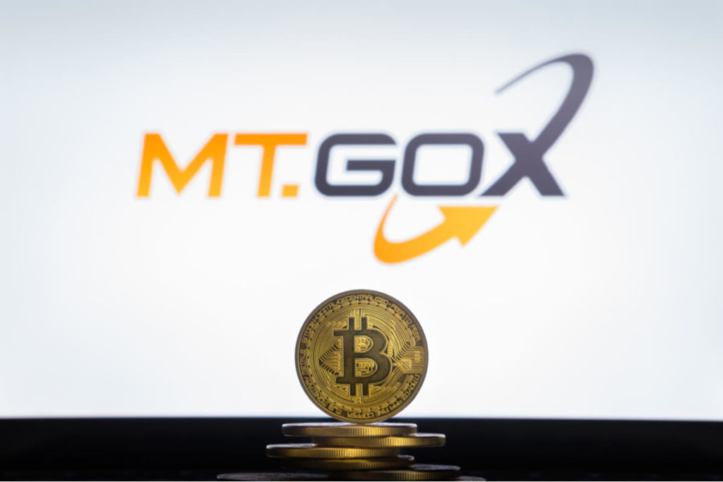 mt gox logo with Bitcoin coin in the foreground