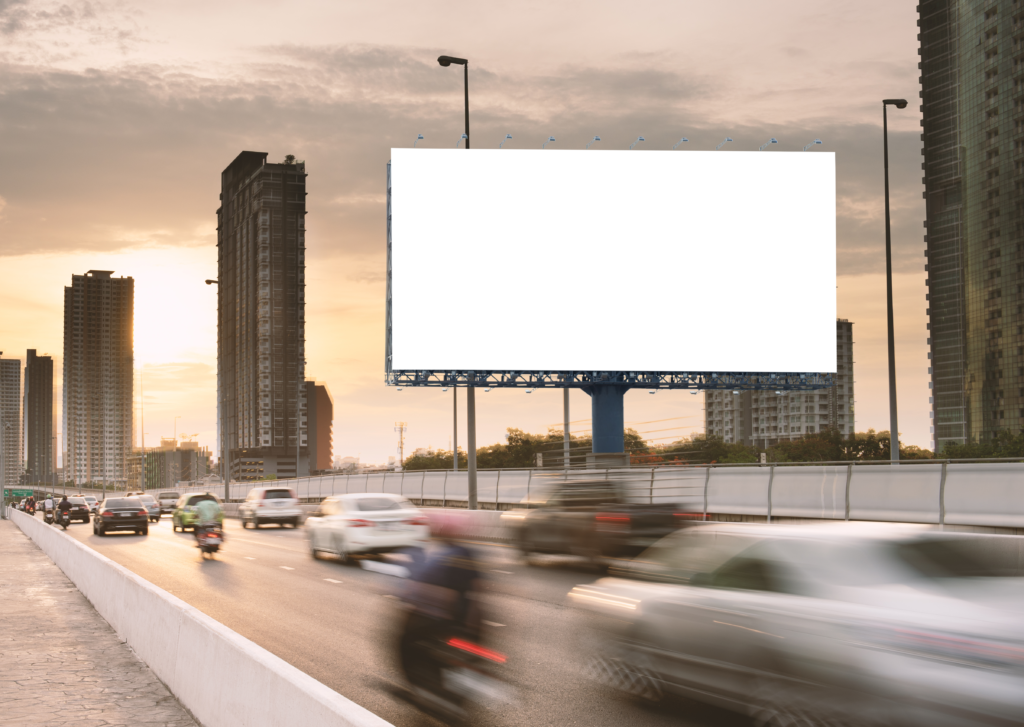 A blank billboard in the middle of a highway