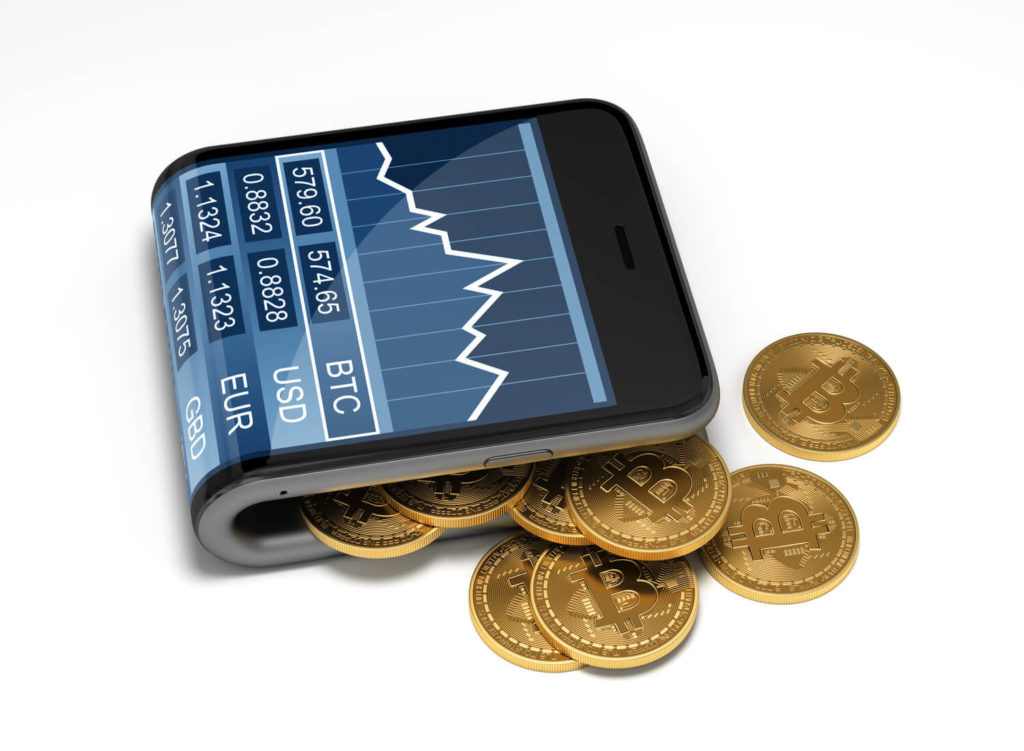 Golden bitcoin coins spilling out of a smartphone. The smartphone is folded in half to look like a wallet.