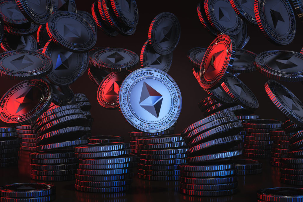 A highlighted silver and blue Ethereum coin surrounding buy a pile of other Ethereum coins