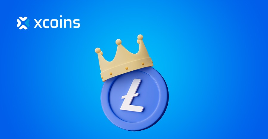 Litecoin illustration wearing a crown with blue background and xcoins logo