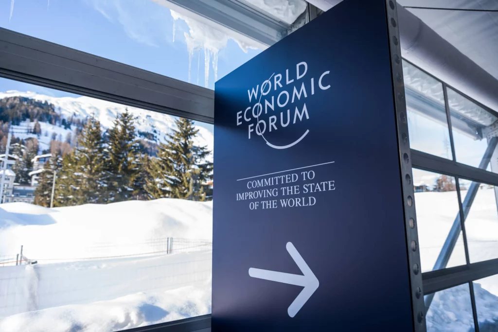 Image of the World Economic Forum’s logo in Davos, Switzerland
