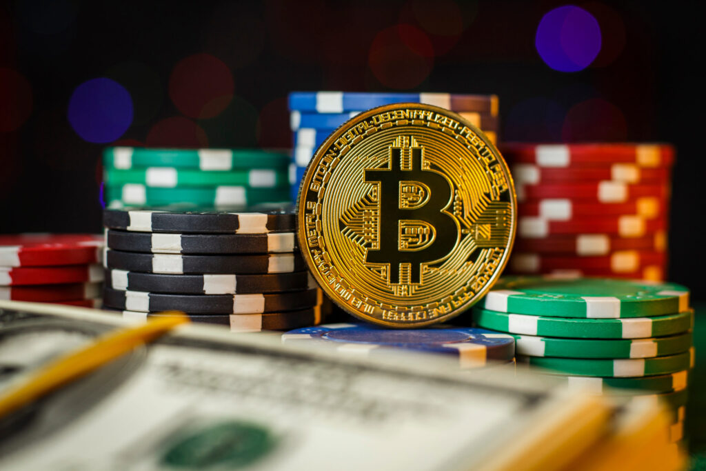 Poker chips with a Bitcoin coin in the middle