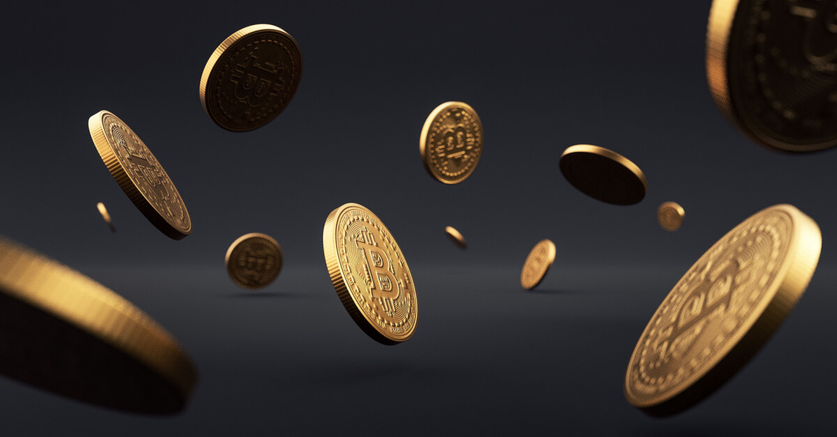 golden bitcoin coins falling from the sky on black background