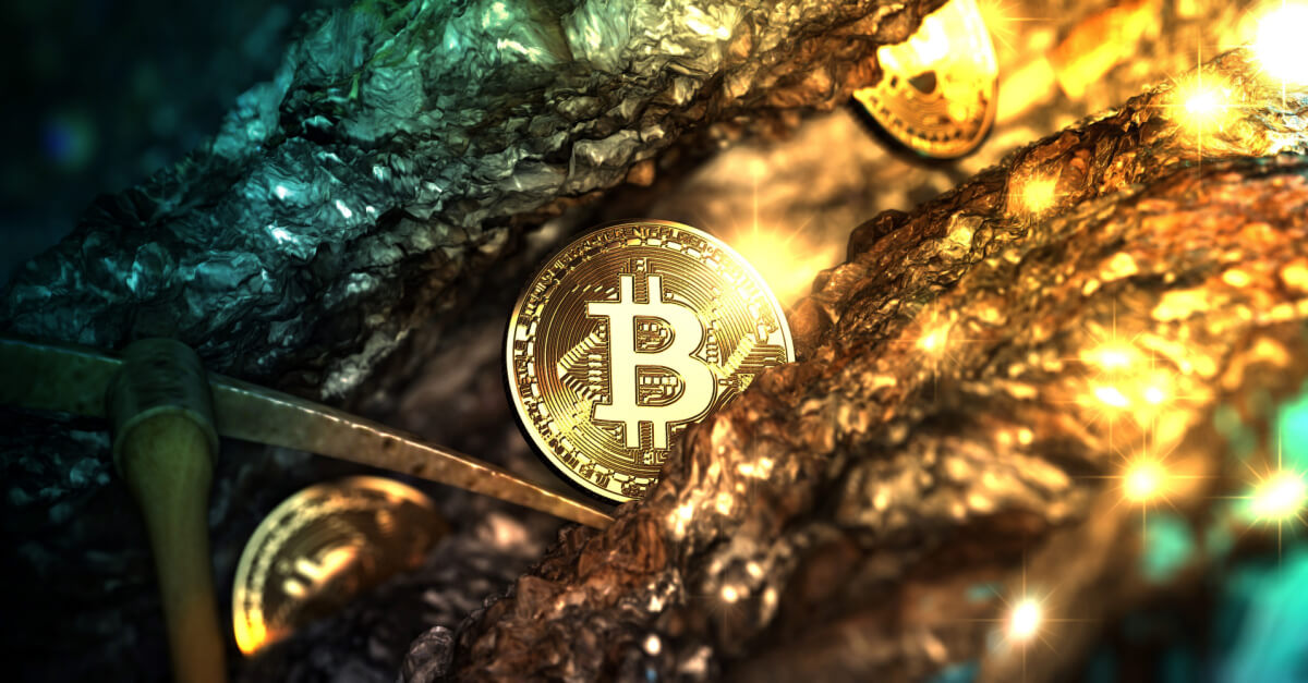 gold bitcoin embedded in gold background