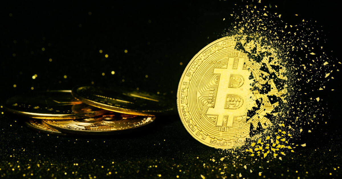 Golden bitcoin breaking into smaller pieces