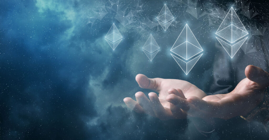 etherem logos suspended in ethereal smoke with pair of hands below them