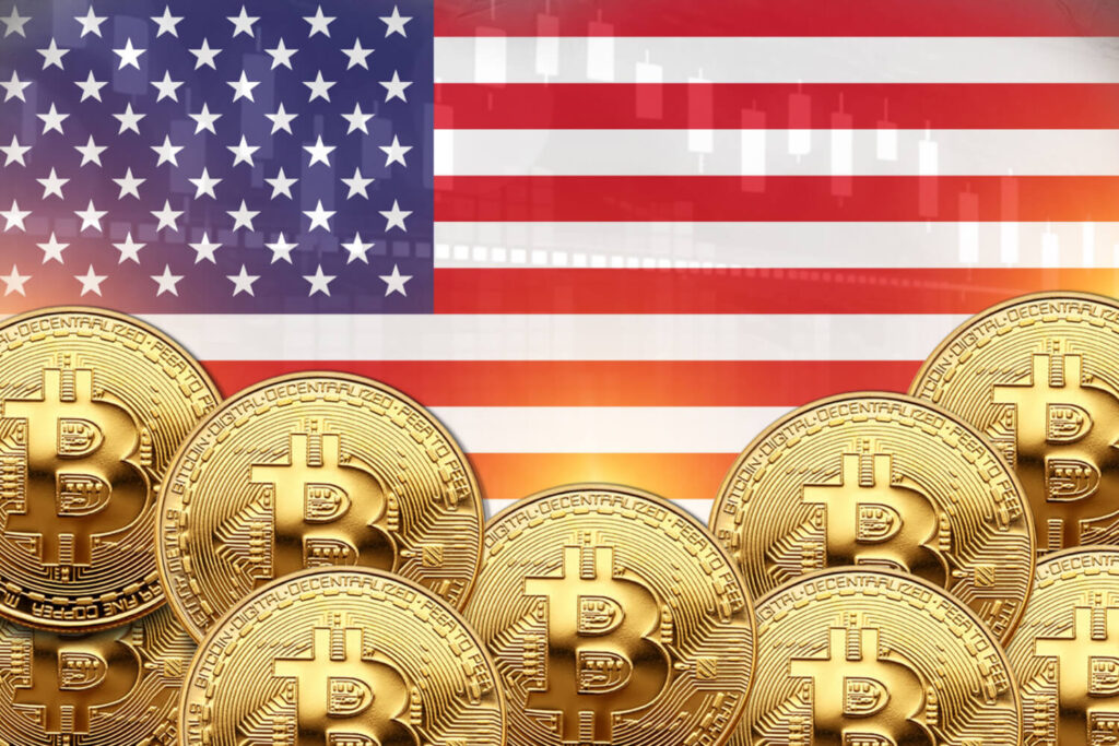 Golden Bitcoin coins layered over one another in front of the US flag