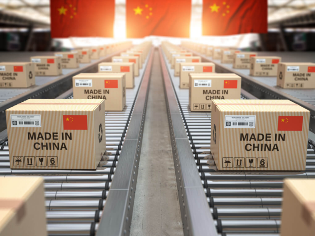 boxes on production line with "made in china" stamps under china flag