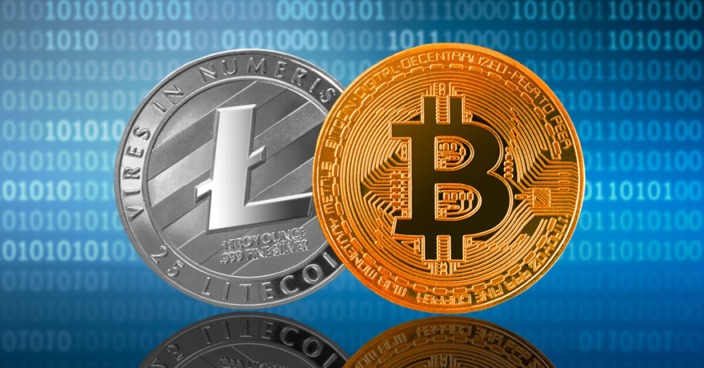 litecoin and bitcoin gold coins before code background