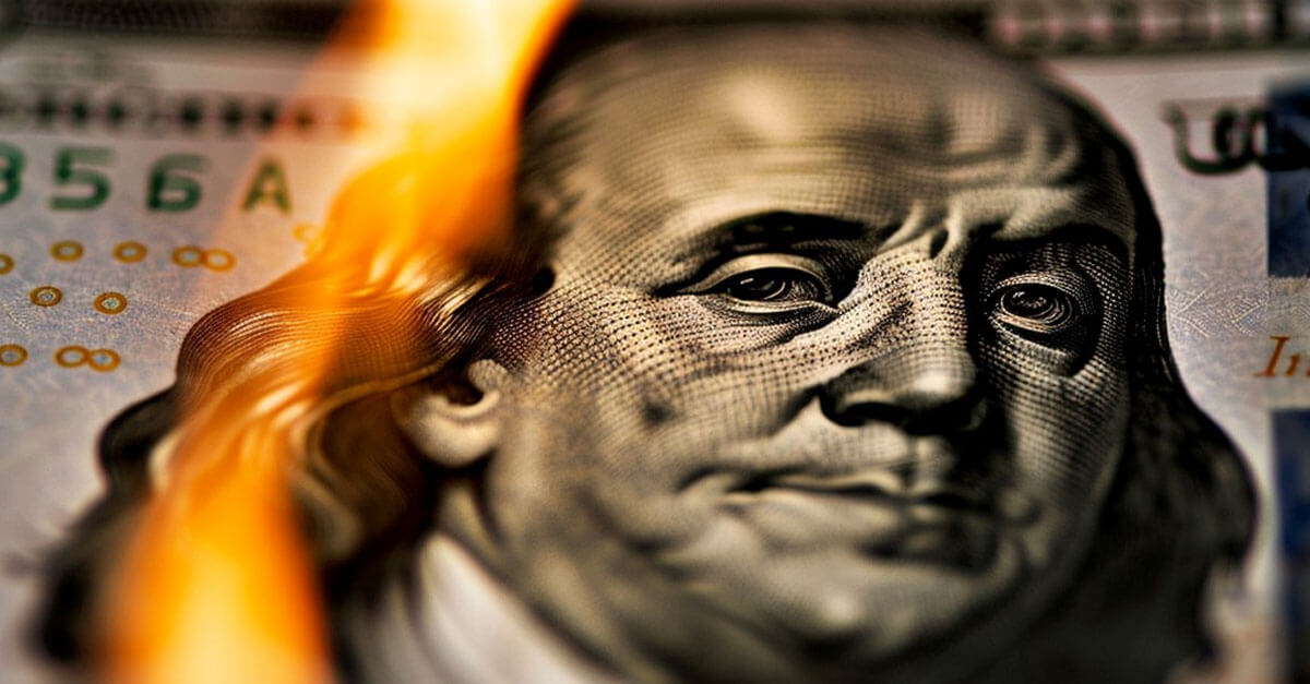 graphic of a close up of a burning USD bank note on black background